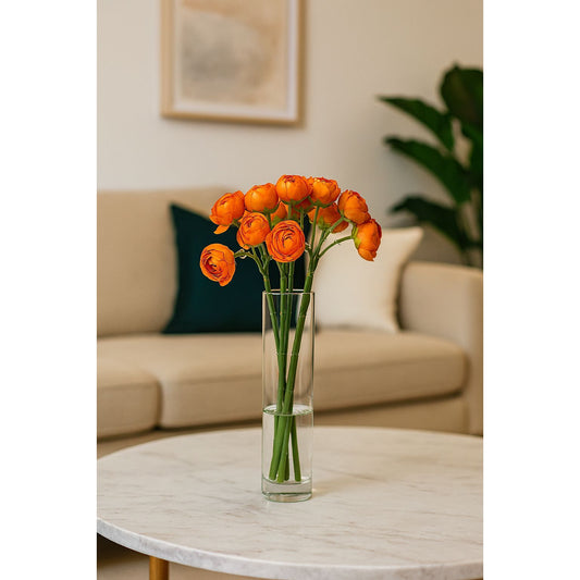 Orange Ranunculus in Clear Glass Vase